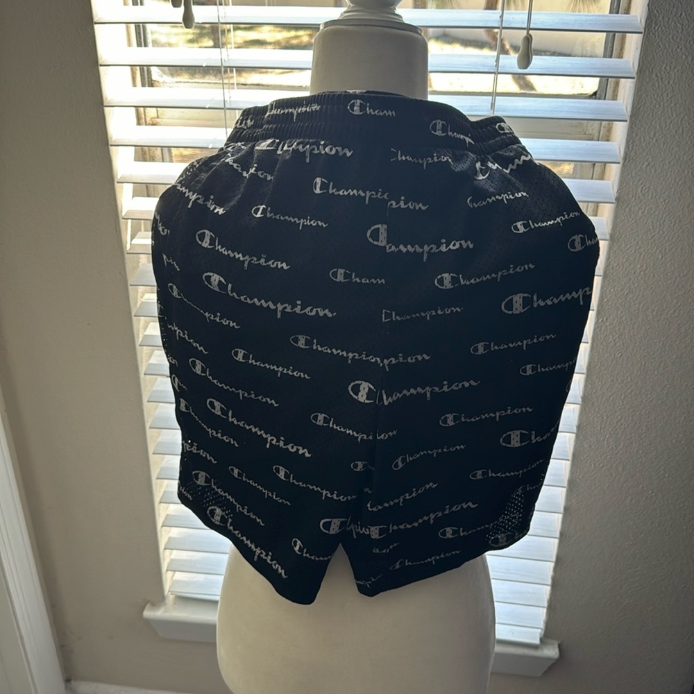 Boys champion shorts with all over print. Good condition. Size large.
